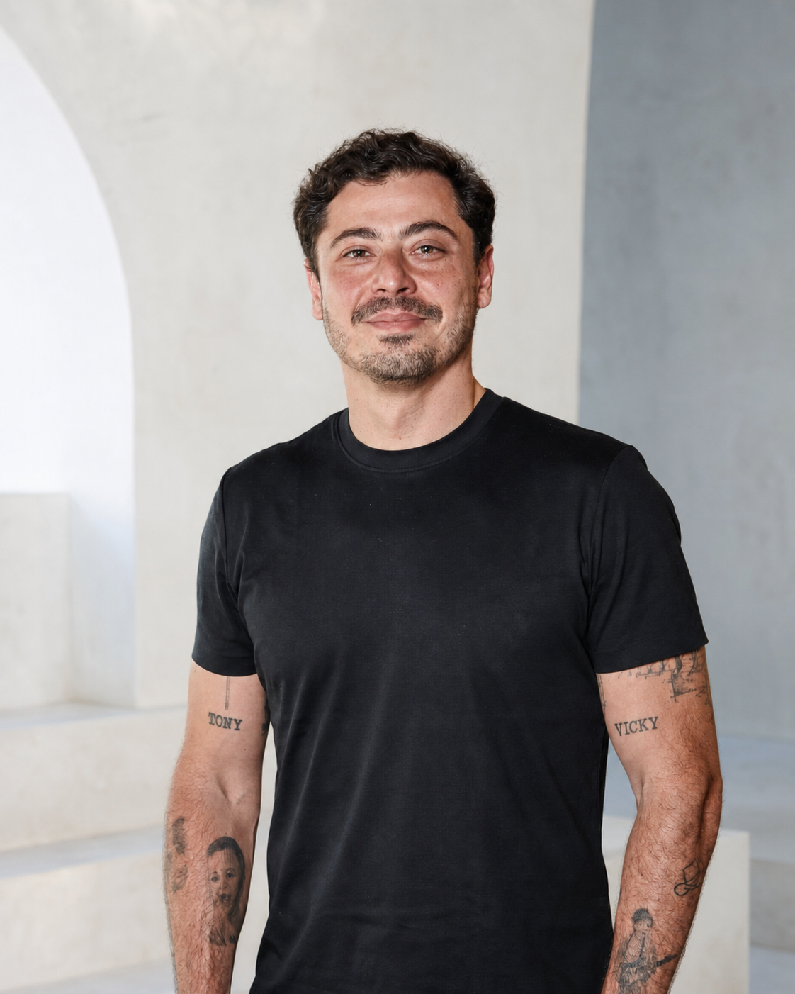 Studio portrait of Celso Ribeiro wearing a black T-shirt